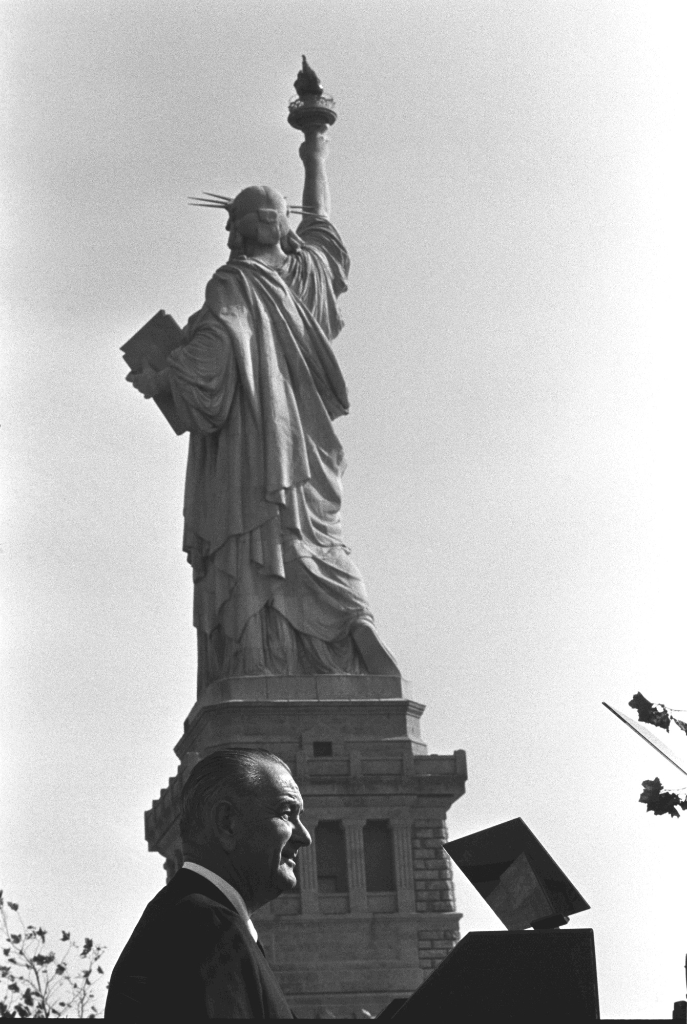 President Lyndon B. Johnson speaking at podium.
