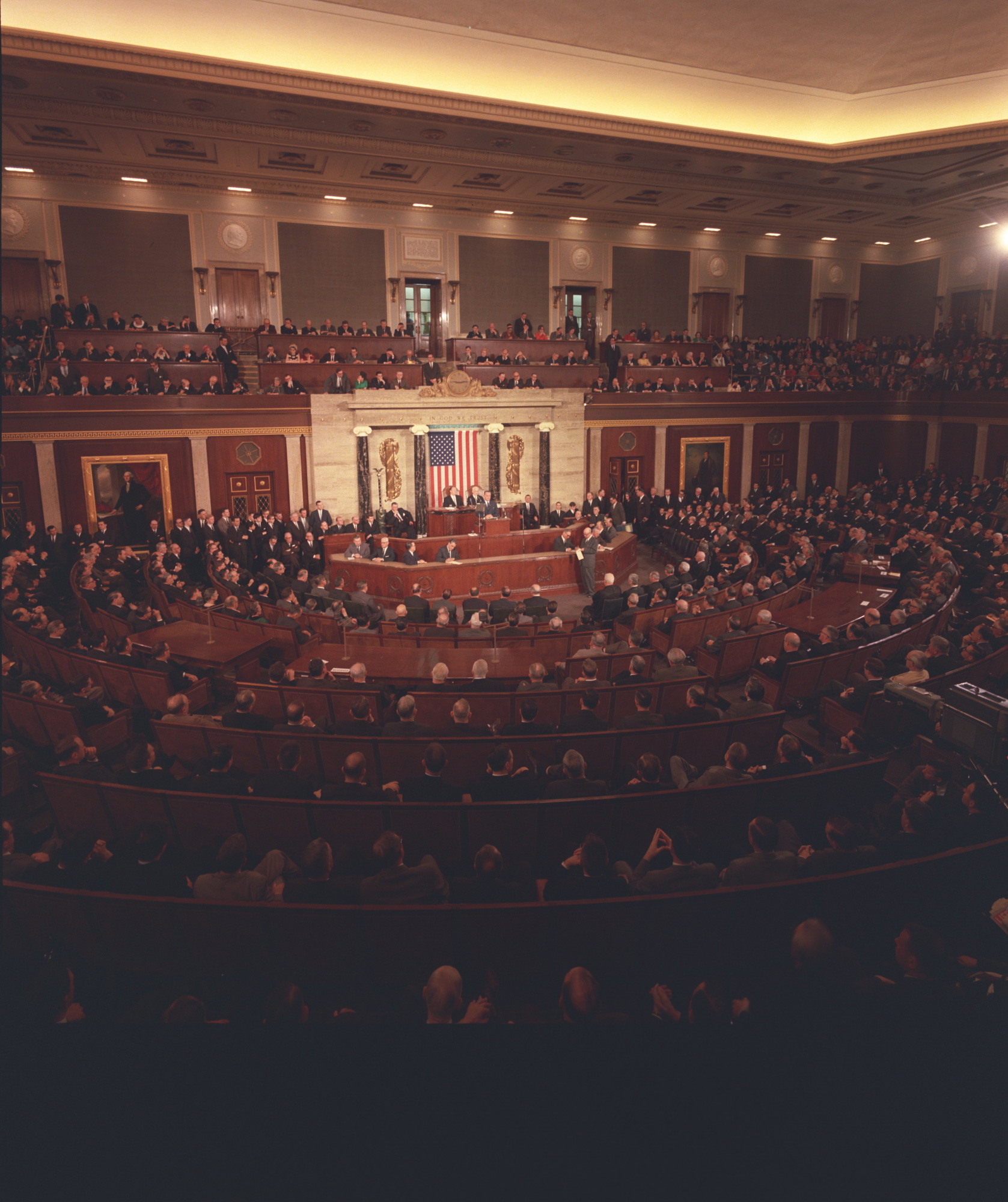 President Lyndon B. Johnson at the speaker's podium addressing a Joint Session of Congress urging the passage of the Voting Rights Act.