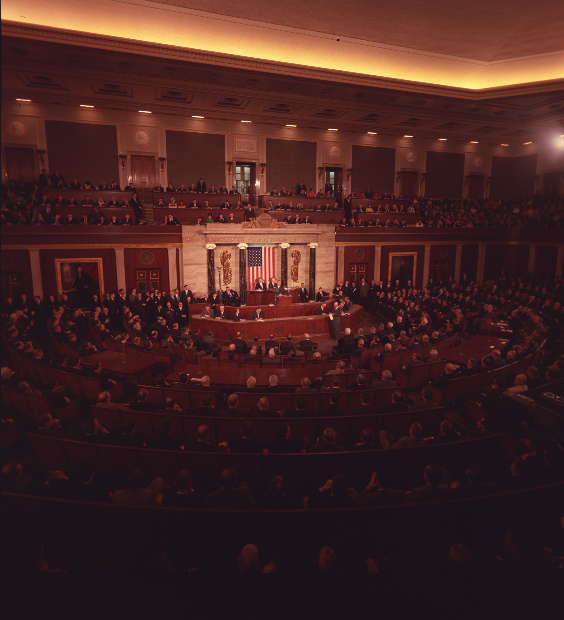 President Lyndon B. Johnson at the speaker's podium addressing a Joint Session of Congress urging the passage of the Voting Rights Act.