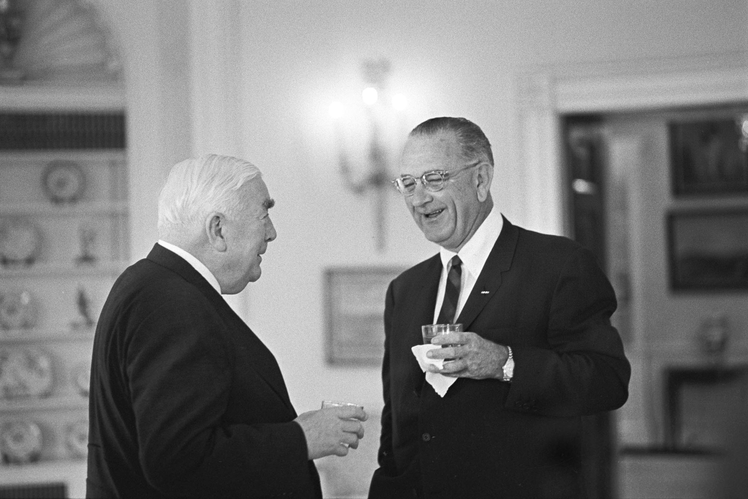 Prime Minister of Australia Robert Menzies and President Johnson, standing with drinks in the Oval Office