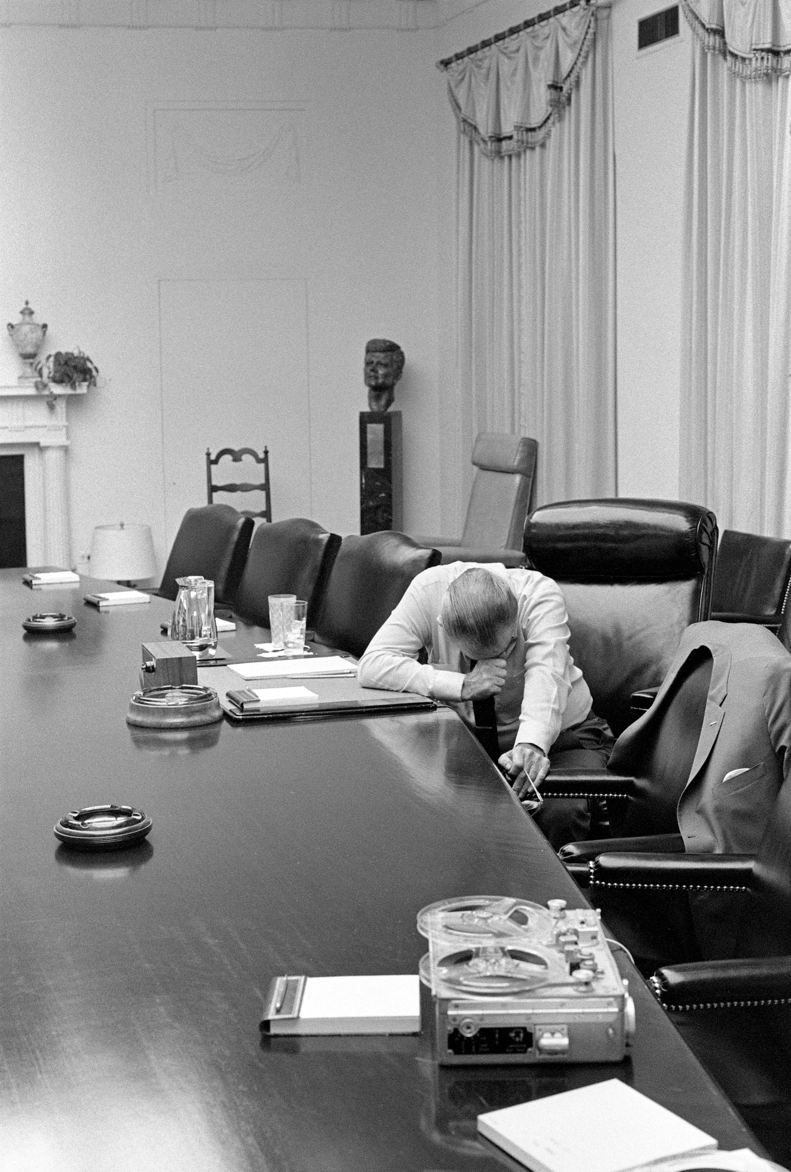 President Lyndon B. Johnson listens to tape sent by Captain Charles Robb (his son-in-law) from Vietnam. LBJ Library photo by Jack Kightlinger #B1274-16.