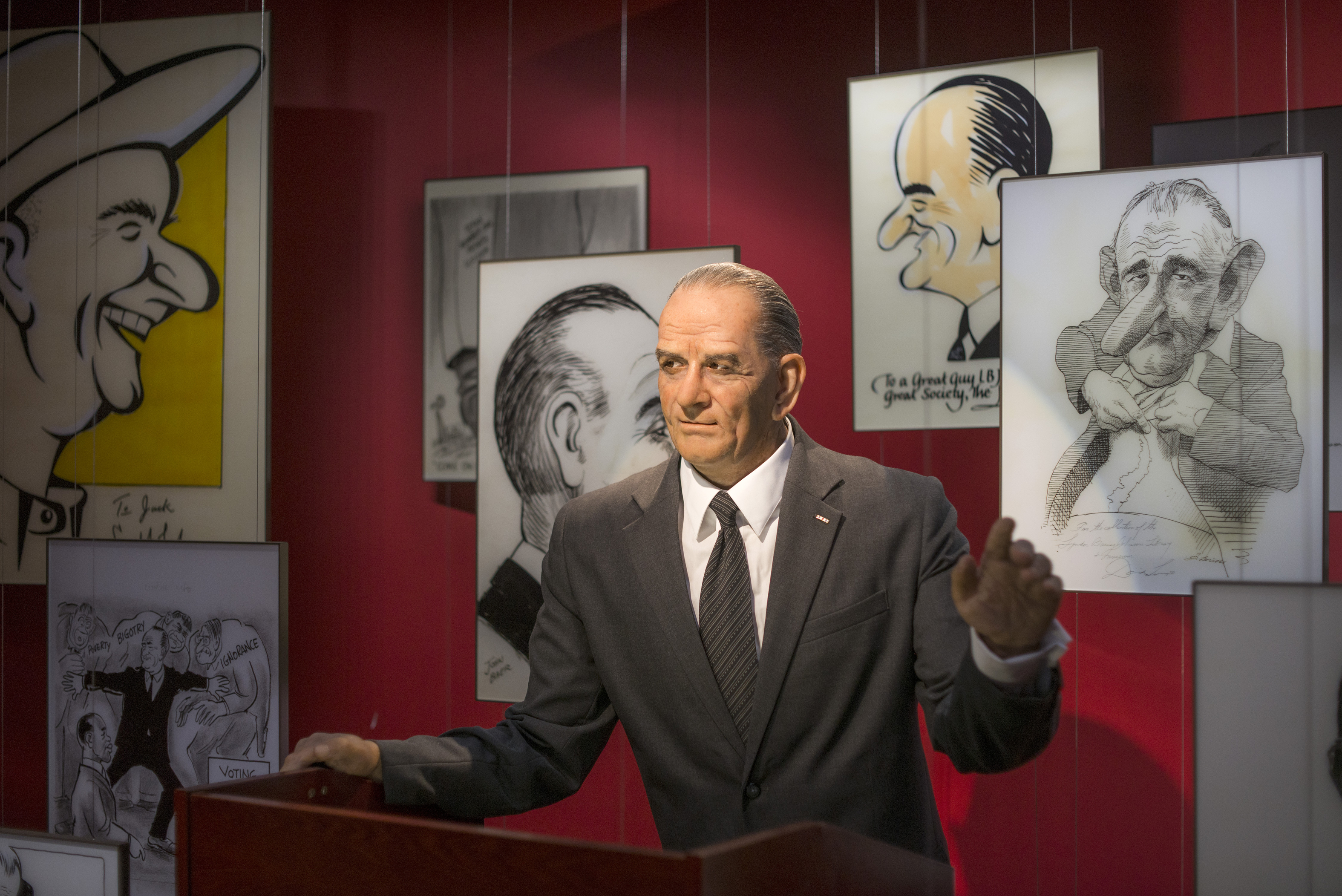 A moving, life-sized animatronic LBJ tells humorous stories to visitors in the permanent Humor and the Presidency exhibit at the LBJ Presidential Library in Austin, Texas.