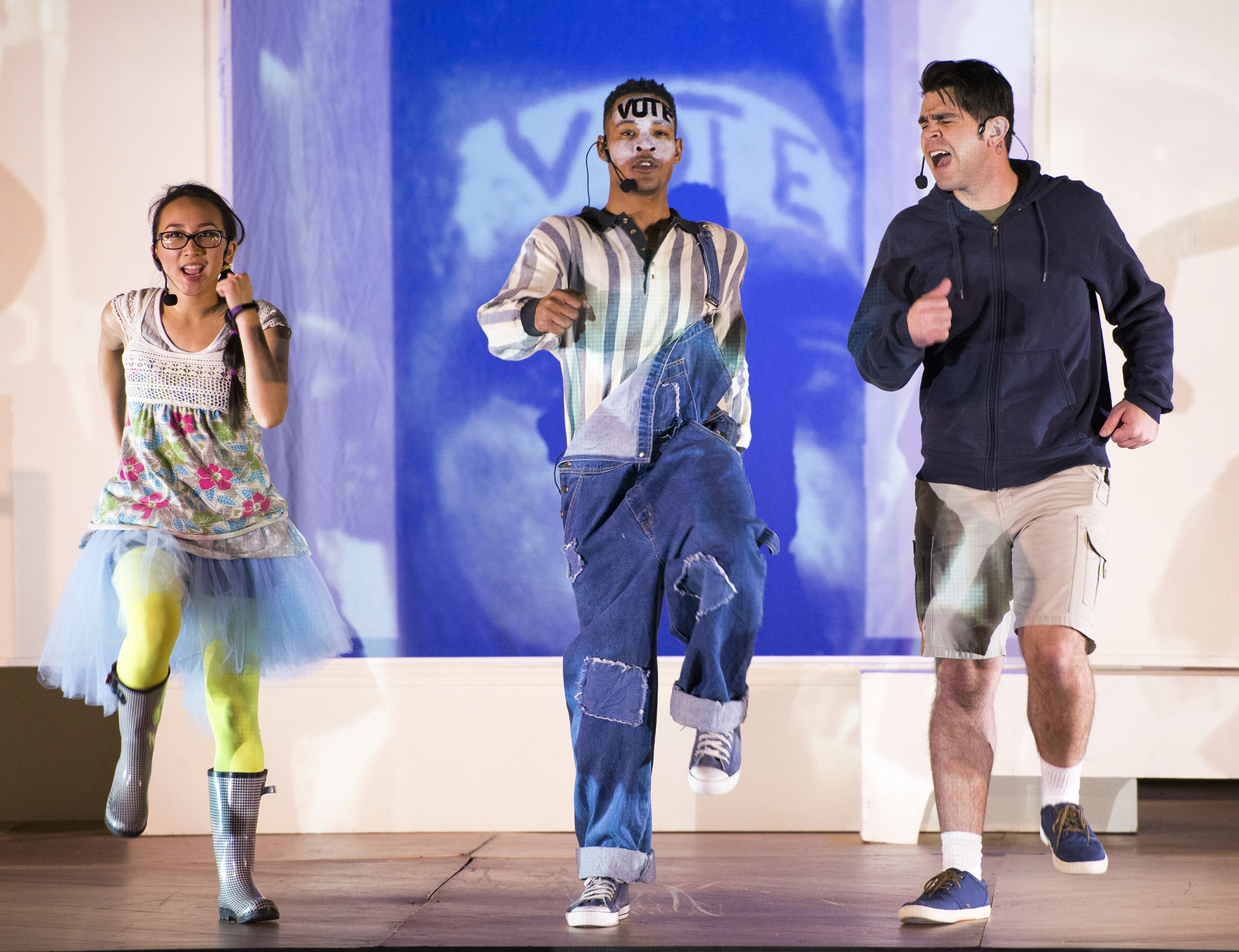Three actors in Liberty! Equality! And Fireworks! perform on-stage at the LBJ Library.
