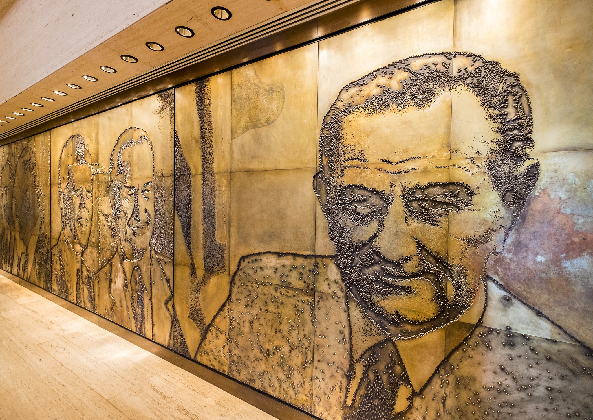 A view of the right side of the mural located in the Great Hall at the LBJ Library.