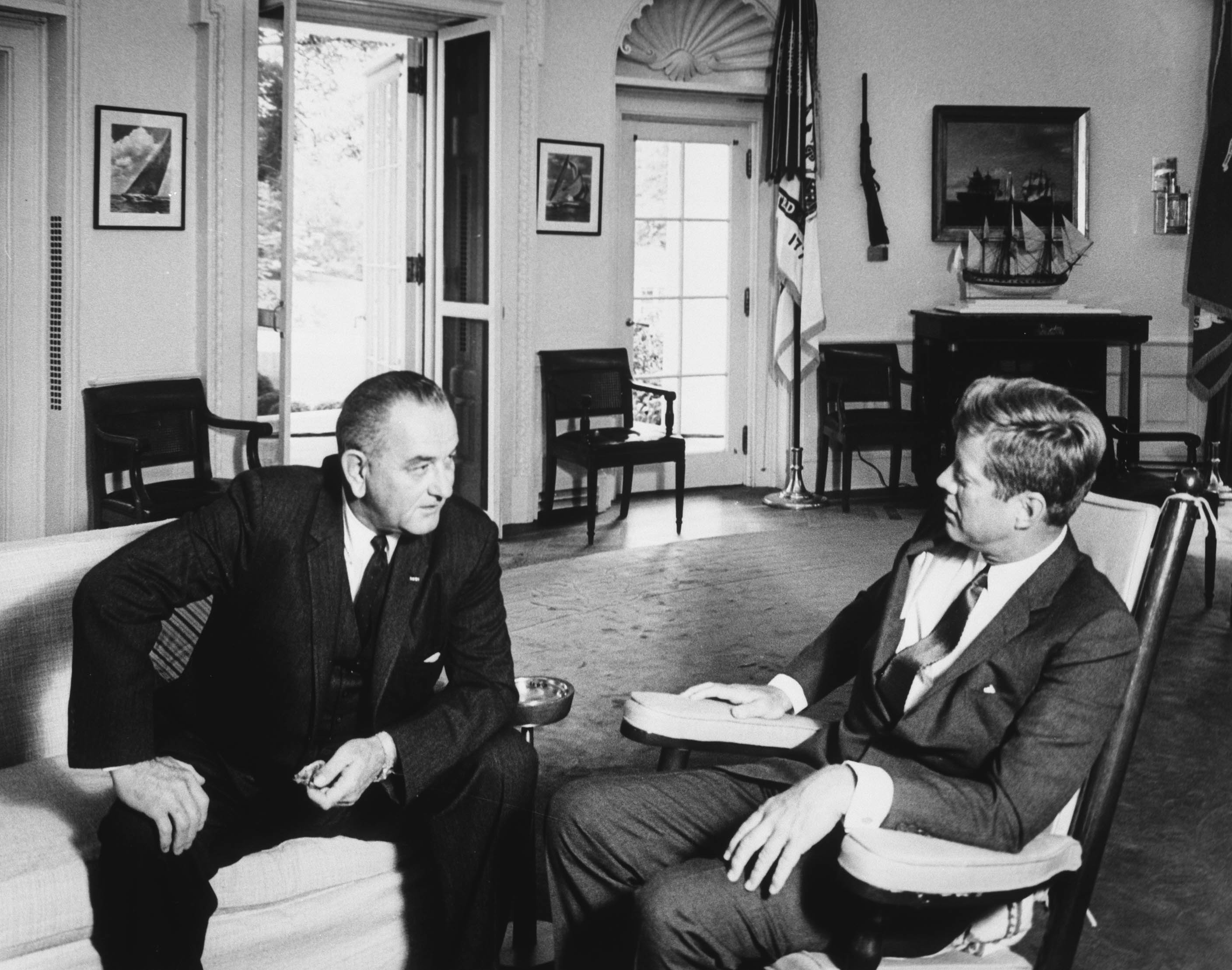 Vice President Lyndon B. Johnson visits President John F. Kennedy in the Oval Office, Sept. 17, 1963.