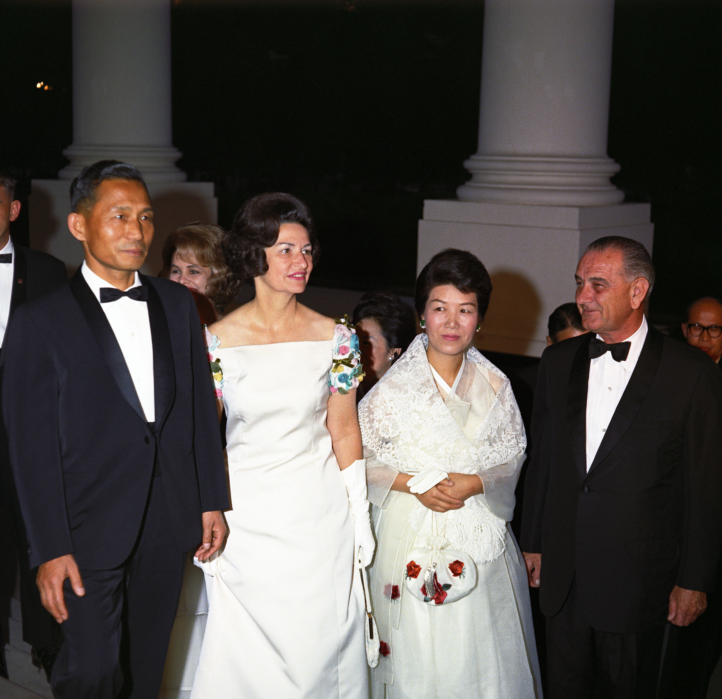 South Korean President Park Chung-hee, Lady Bird Johnson, South Korean First Lady Yuk Young-soo, and President Johnson outside of the Mayflower Hotel in Washington, D.C