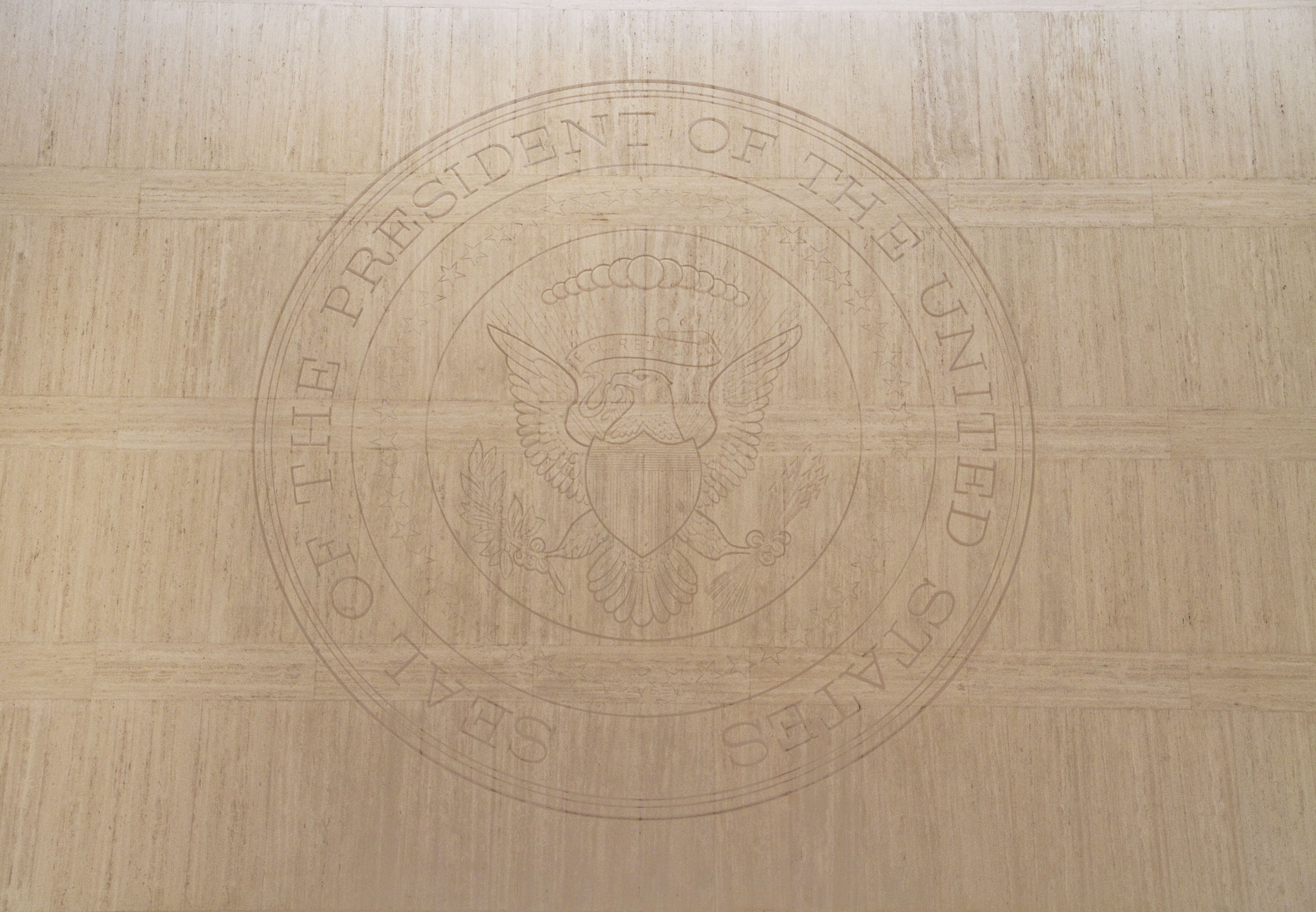 A close up view of the presidential seal in the Great Hall.
