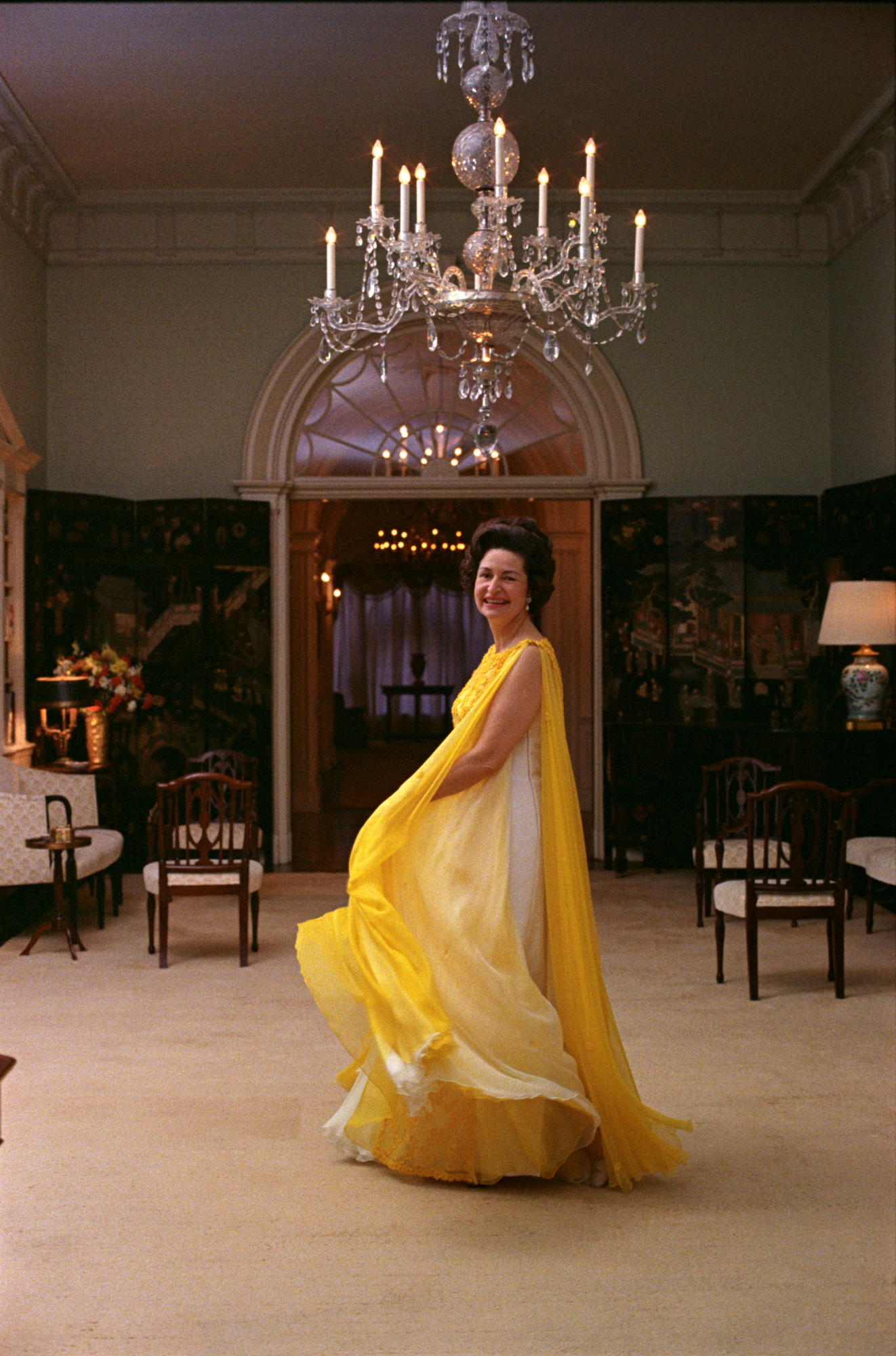 Portrait of Lady Bird Johnson in a yellow evening gown