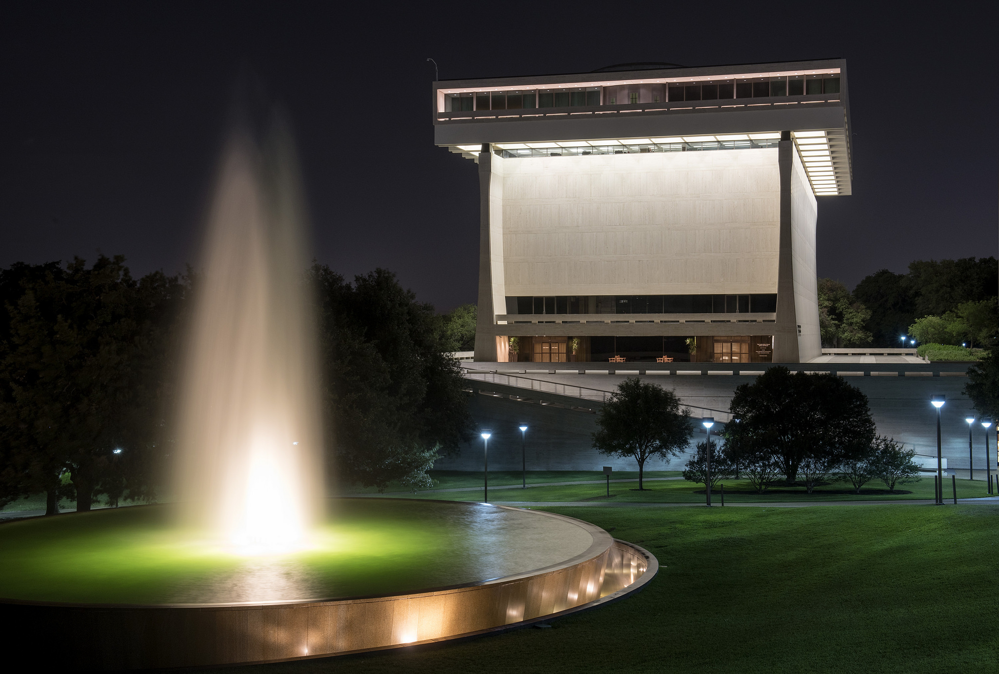A nighttime view of the LBJ Library from the LBJ lawn.
