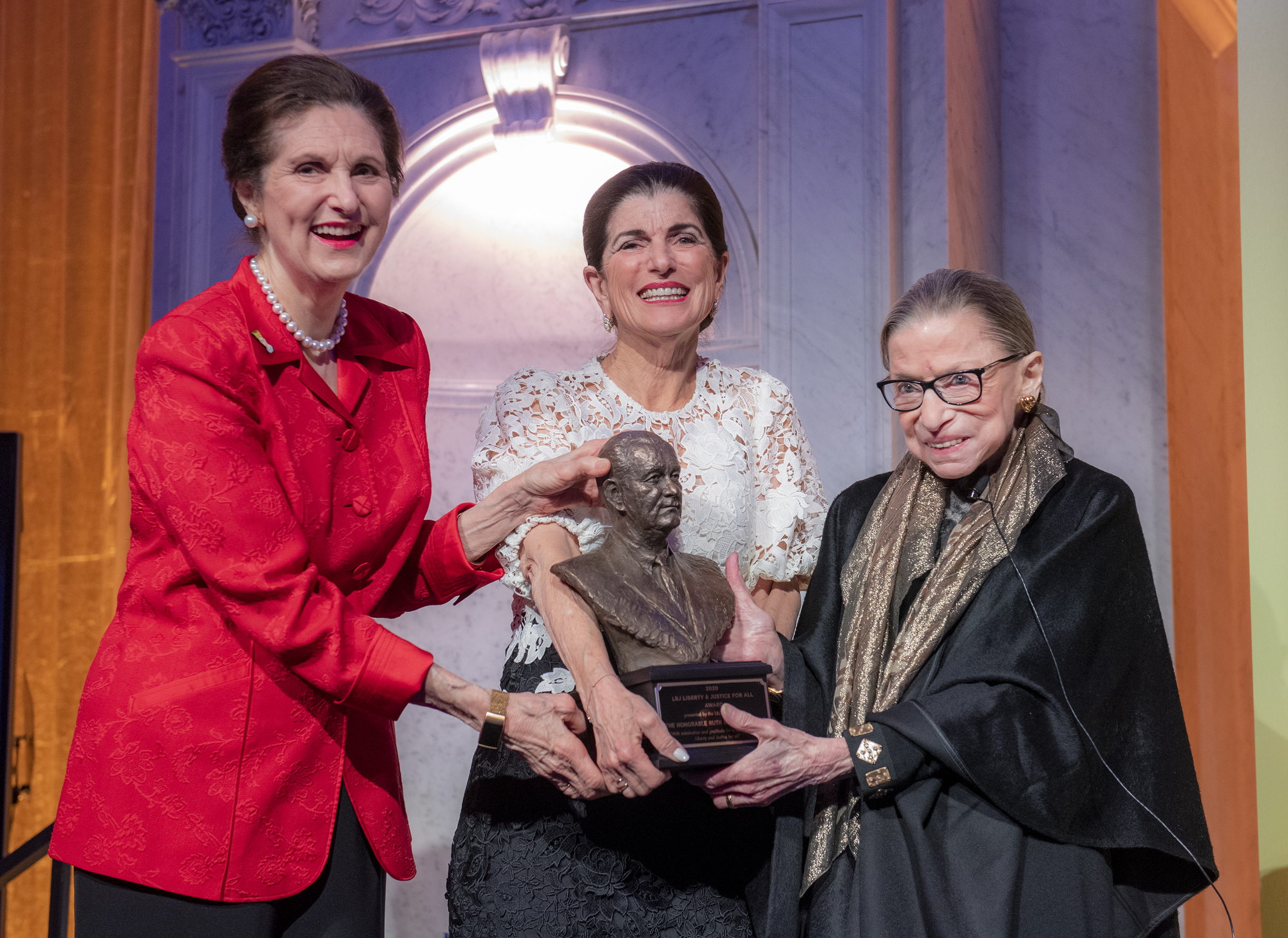 U.S. Supreme Court Justice Ruth Bader Ginsburg, right, receives the LBJ Liberty & Justice for All Award from Lynda Johnson Robb, left, and Luci Baines Johnson at the Library of Congress in Washington, D.C., on Jan. 30, 2020. Photo by Jay Godwin #JG7_9453.