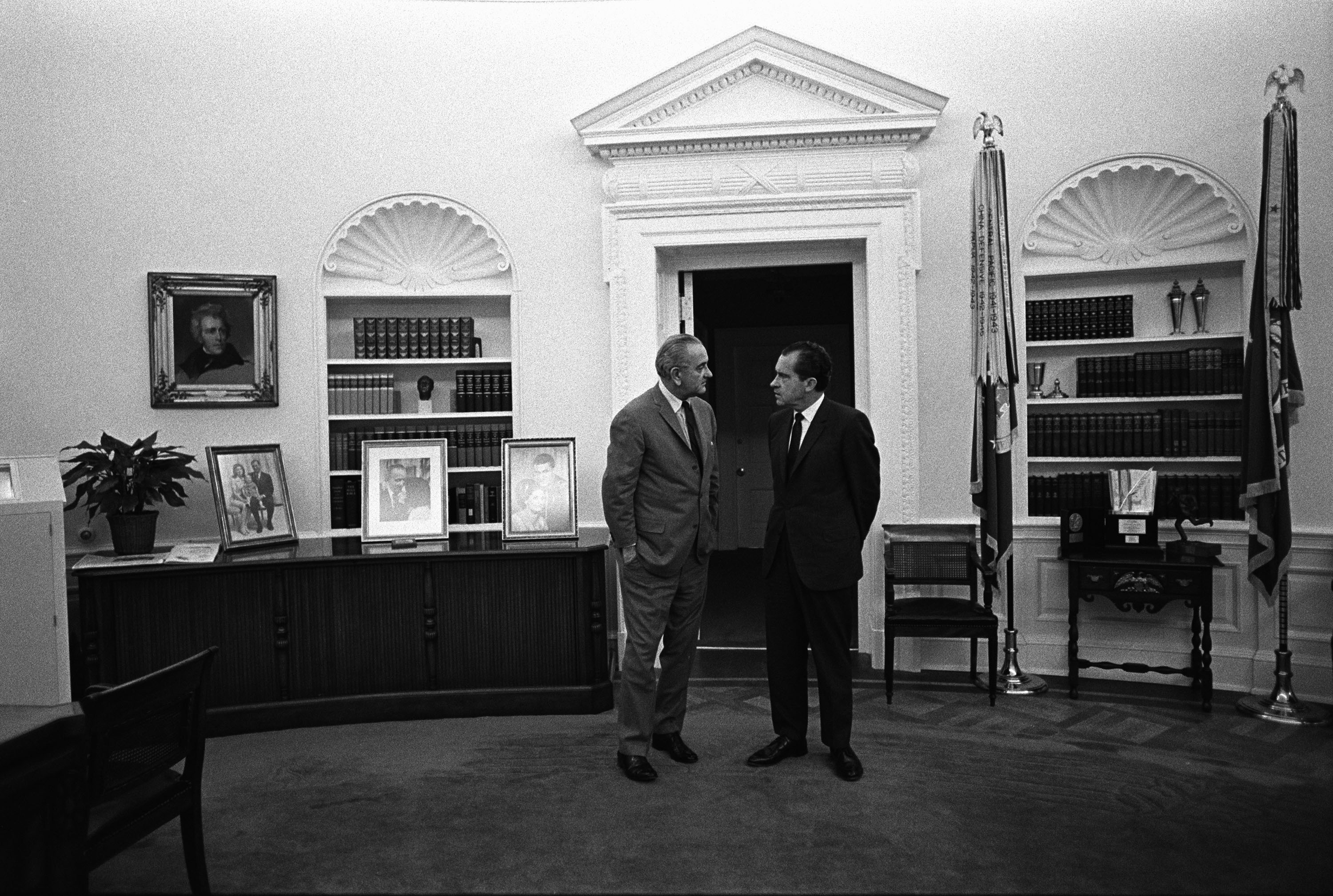 President Lyndon B. Johnson and president-elect Richard Nixon meet in the Oval Office.