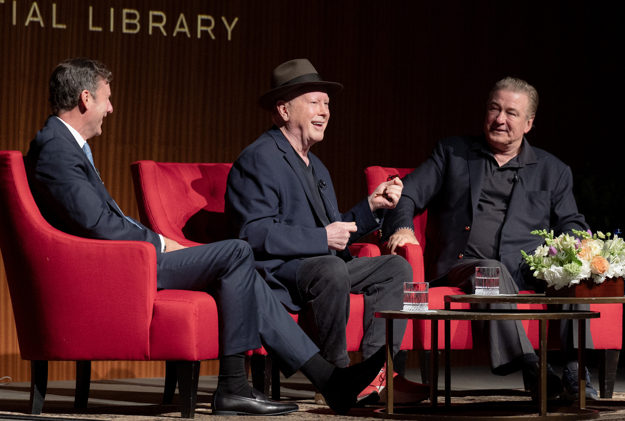 Mark Updegrove, left, Darrell Hammond and Alec Baldwin