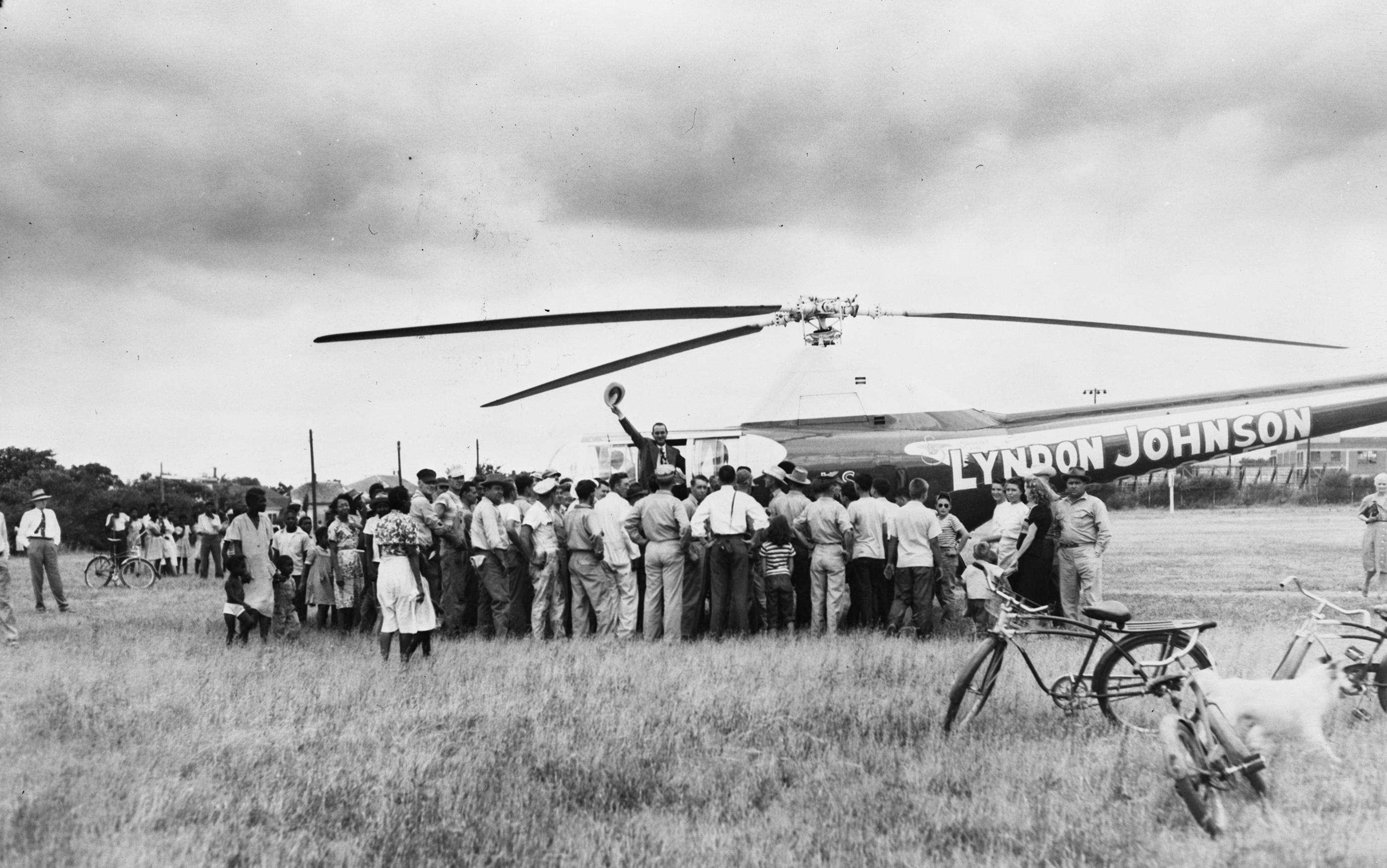 From his campaign helicopter, Congressman Lyndon B. Johnson speaks to a group of supporters while campaigning for Senate in Hillsboro, Texas.