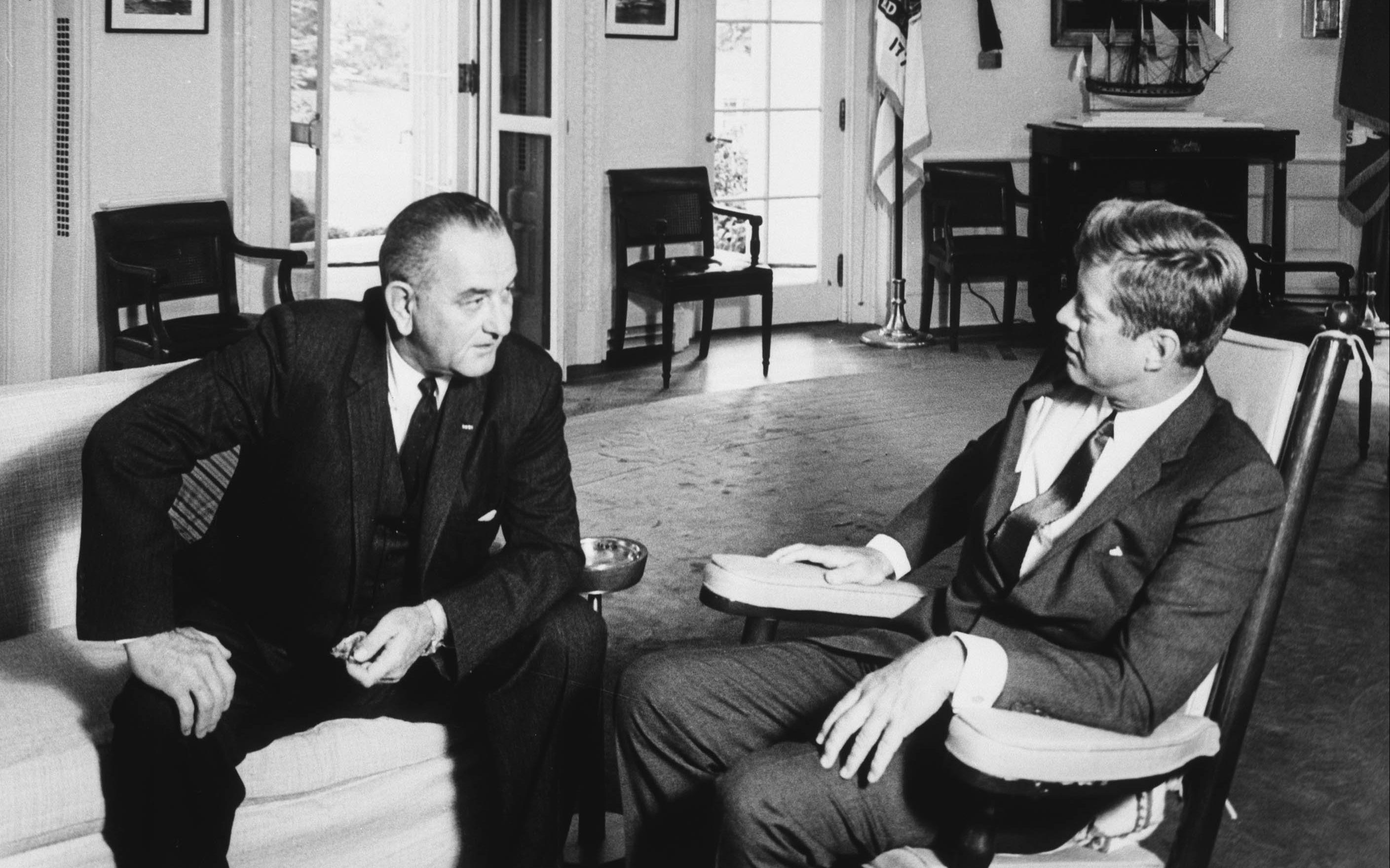 Vice President Lyndon B. Johnson visits President John F. Kennedy in the Oval Office