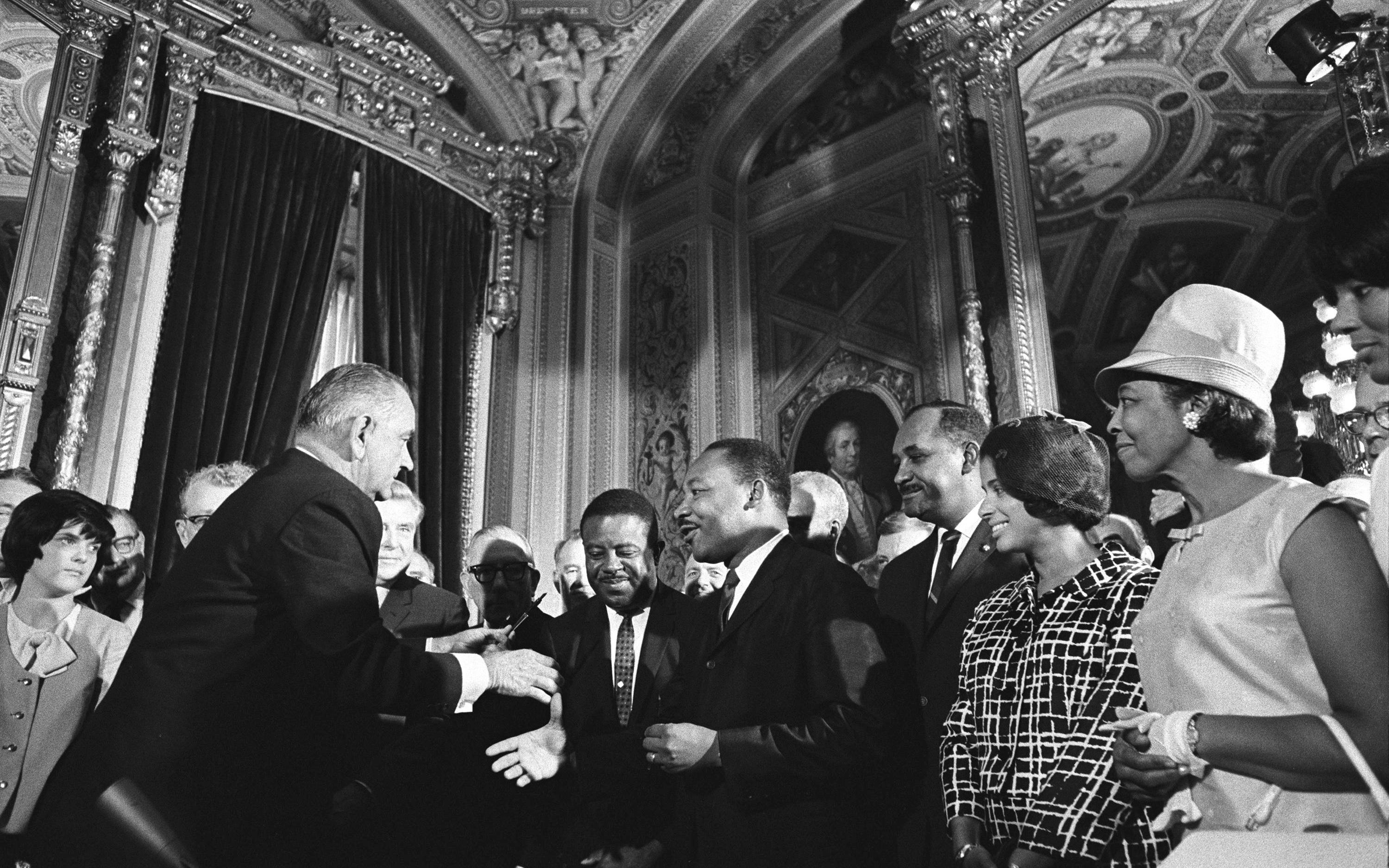 Photo - LBJ signing the Voting Rights Act of 1965 - LBJ Library