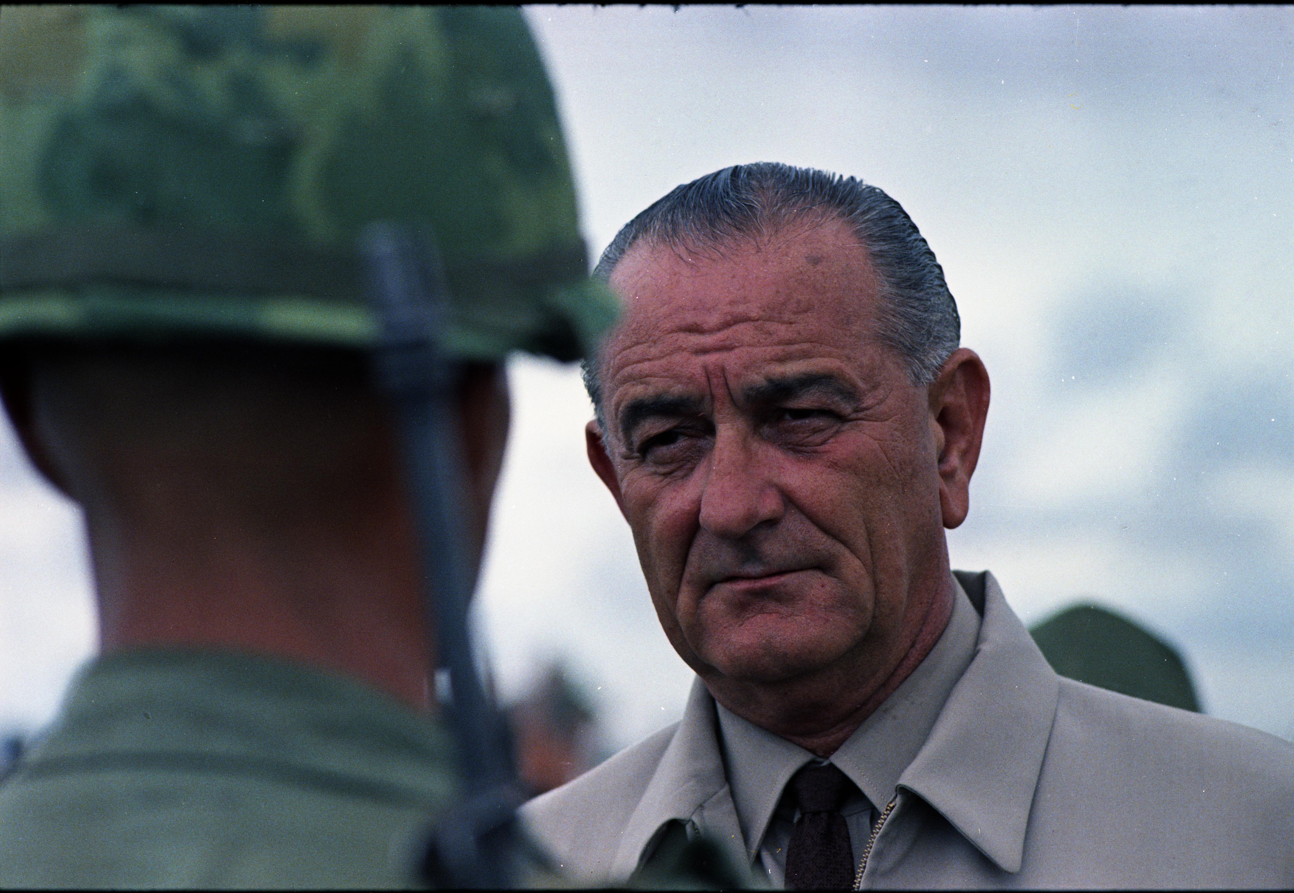 President Lyndon B. Johnson visits with U.S. troops. LBJ Library photo by Yoichi Okamoto #C3598-23a.