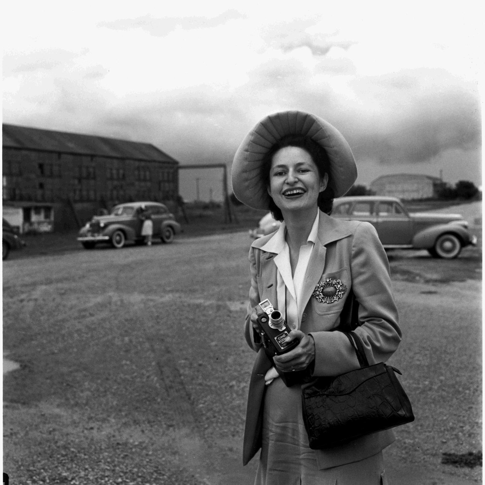 Lady Bird Johnson with movie camera. LBJ Library photo by Austin American-Statesman #41-6-84.