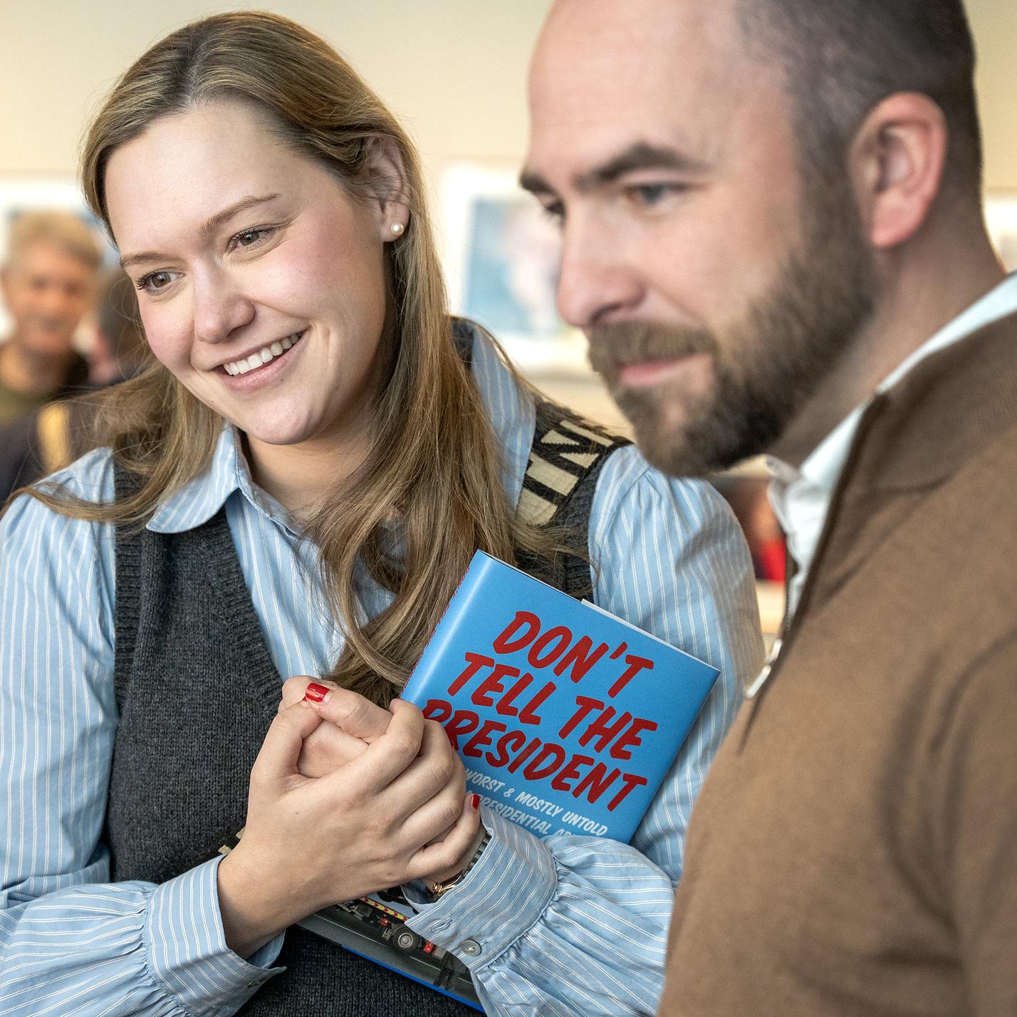 Caroline and Judd Messer have a book signed at the event. LBJ Library photo by Jay Godwin