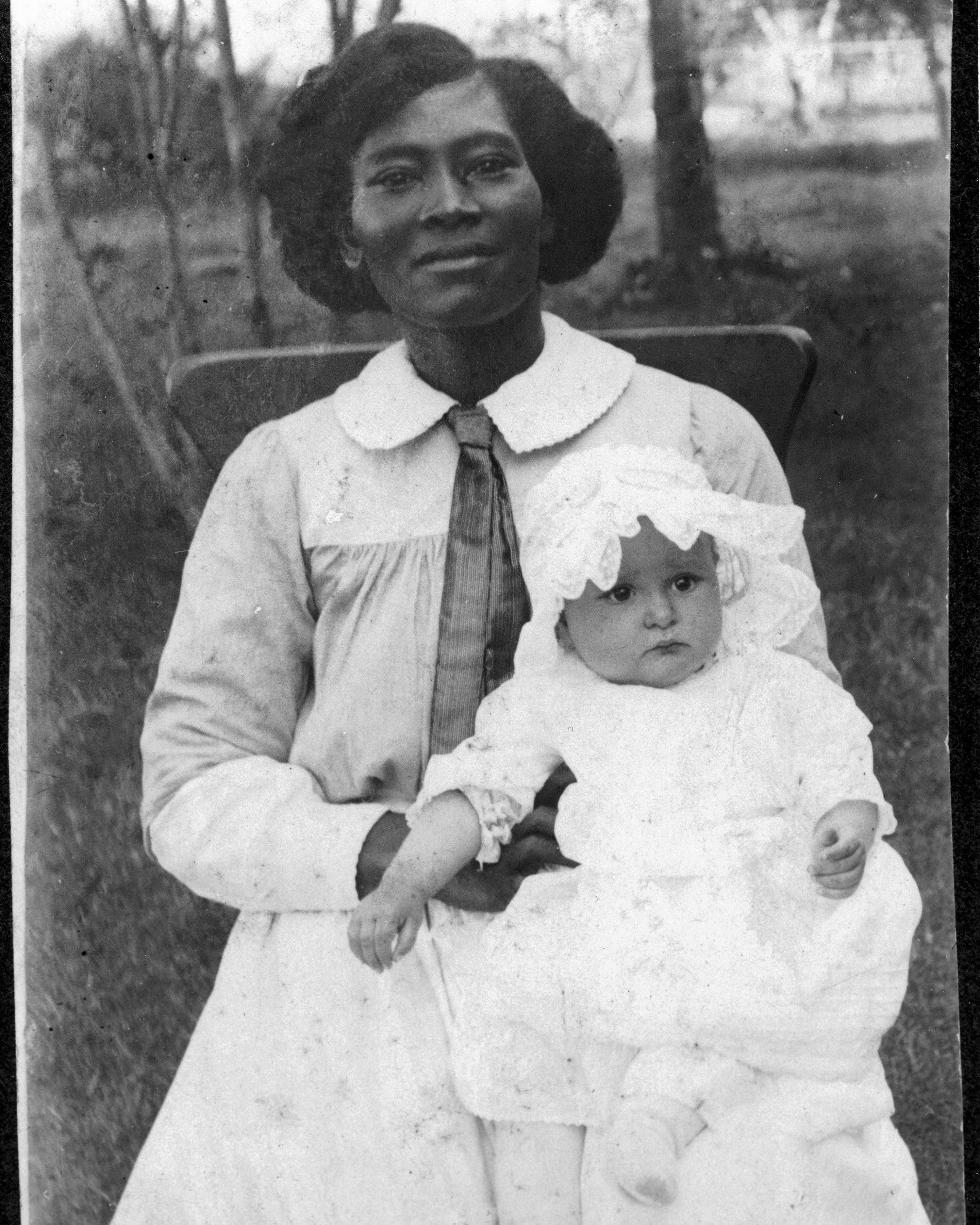 Portrait of Claudia Alta Taylor (age about 6 months) with Alice Tittle, who nicknamed her "Lady Bird"