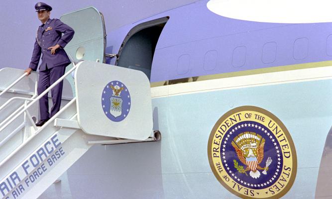 Col. James Cross poses outside Air Force One. 
