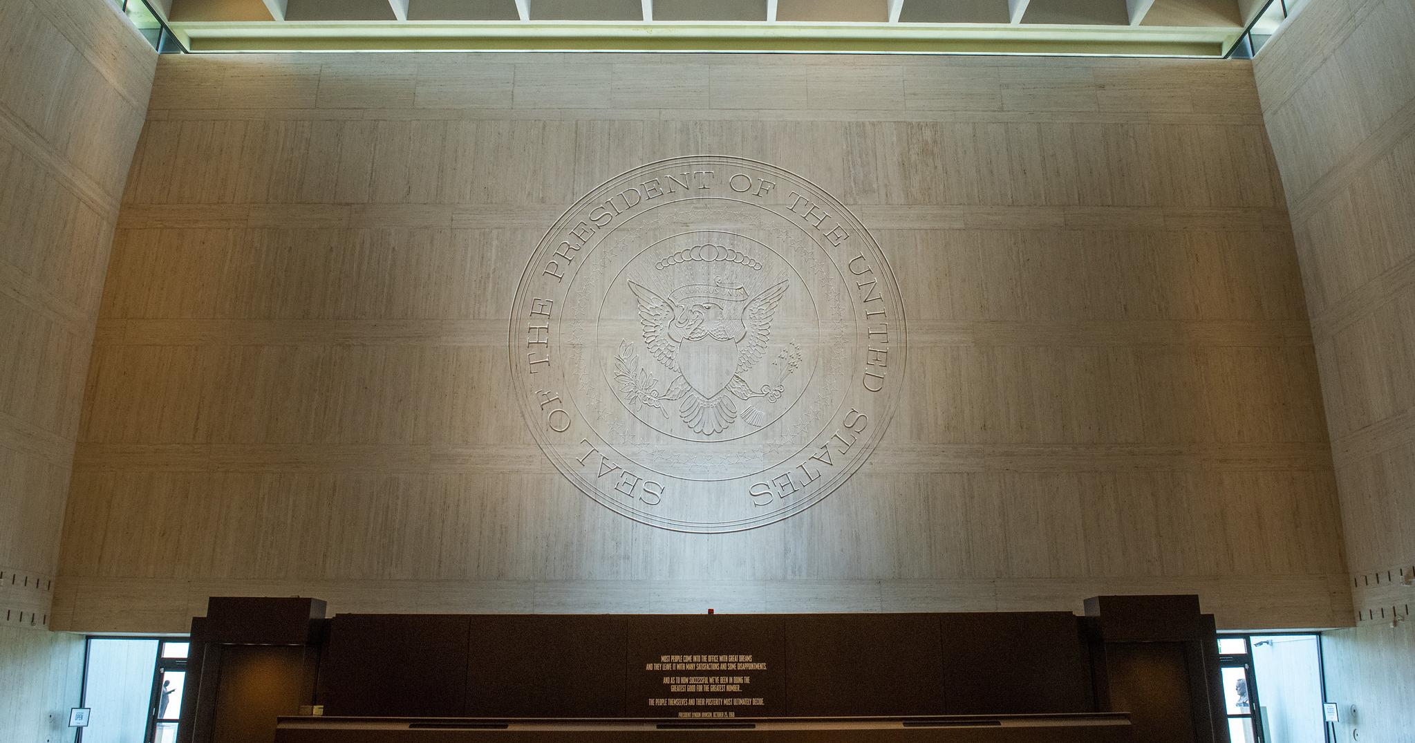 The Presidential Seal on a wall in the Great Hall at the LBJ Library.