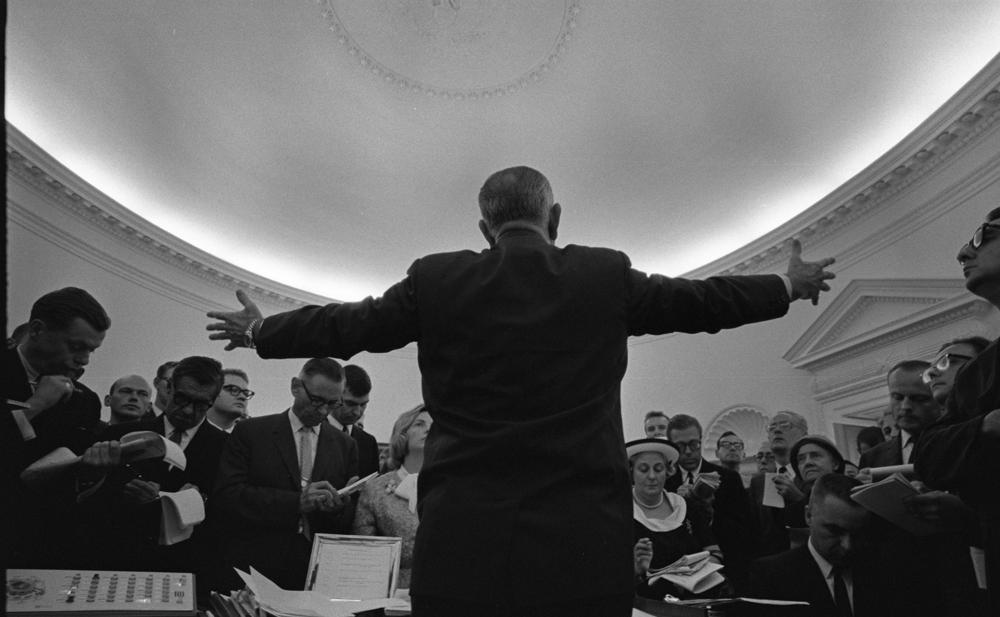President Lyndon B. Johnson speaks to the press