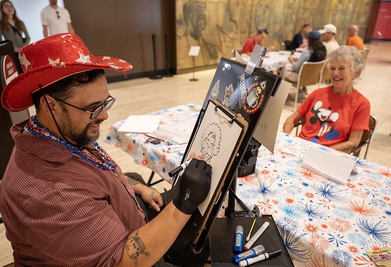 Cheryl Sebastian sits for Silly Artist Jeremy Martinez.